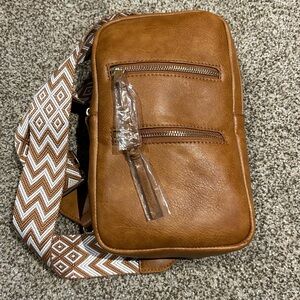 Emery Lane Faux Leather Sling/Backpack purse. NWT